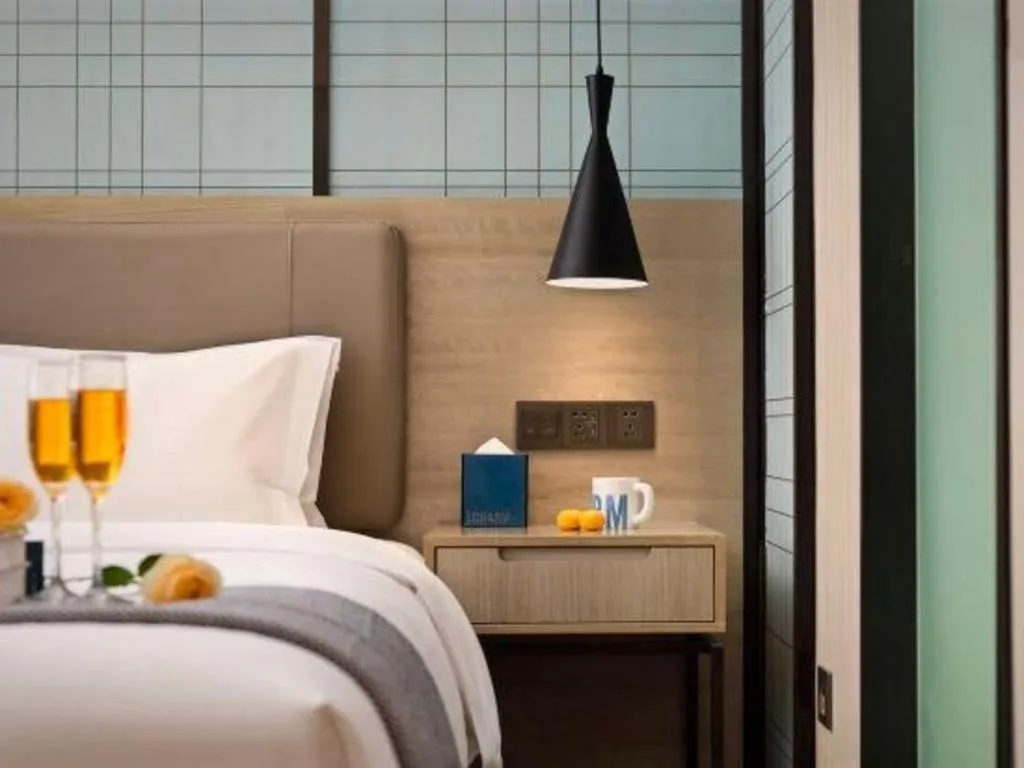 Bed in Echarm Hotel Changsha Wuyi Square Railway Metro Station