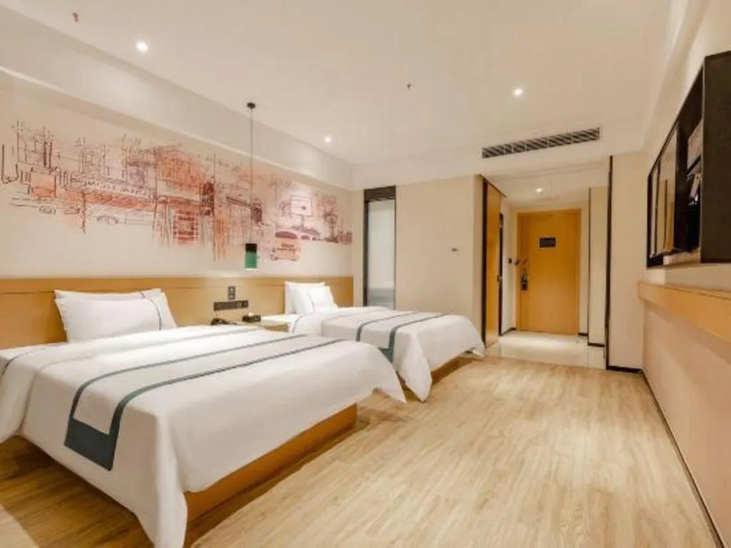 Bed in City Comfort Inn Dongguan Dalingshan Xinli Agricultural Wholesale