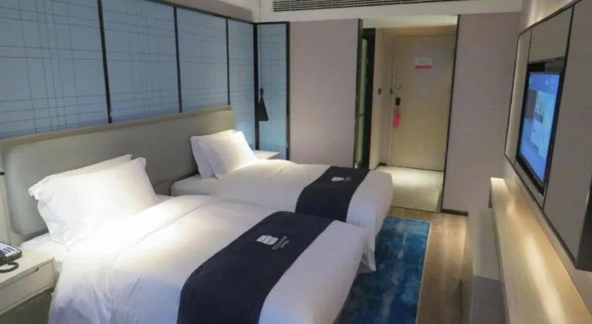 Bed in Echarm Hotel Nanchang Bayi Square Metro Station Wushang MALL
