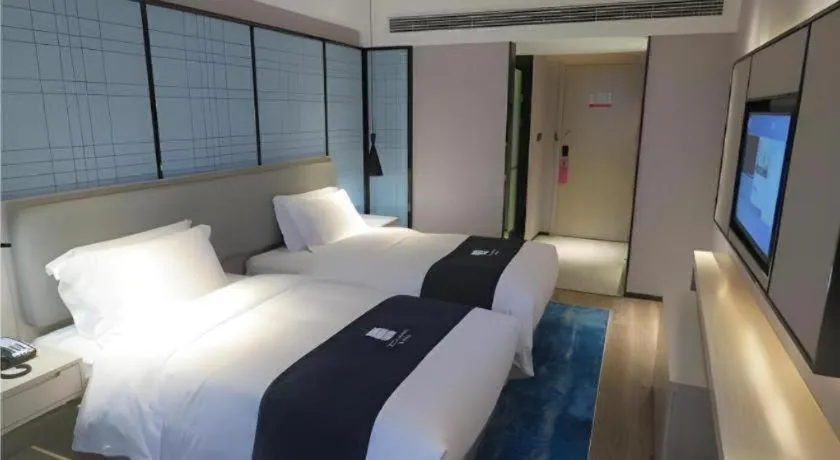 Bed in Echarm Hotel Nanchang Bayi Square Metro Station Wushang MALL
