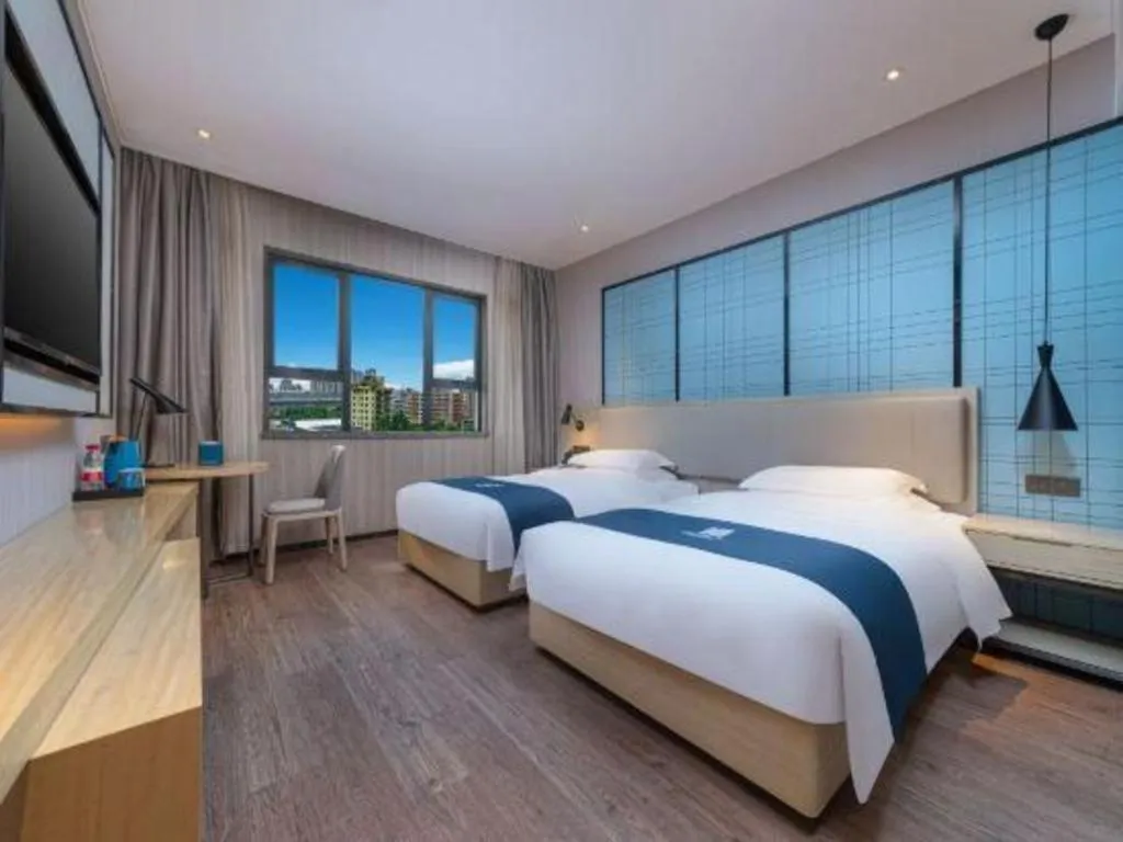 Bed in Echarm Hotel Nanchang Bayi Square Metro Station Wushang MALL