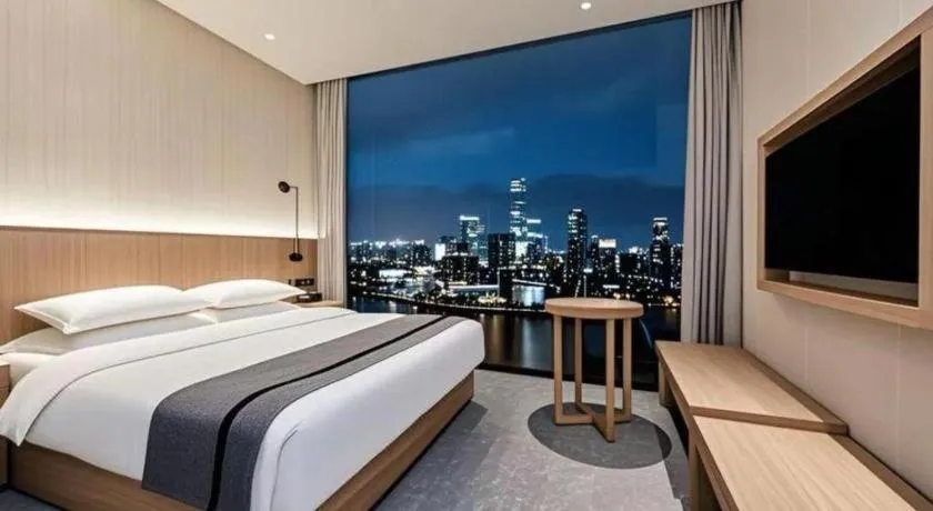 Bed in Borrman Hotel Chongqing Liberation Monument Hongyadong