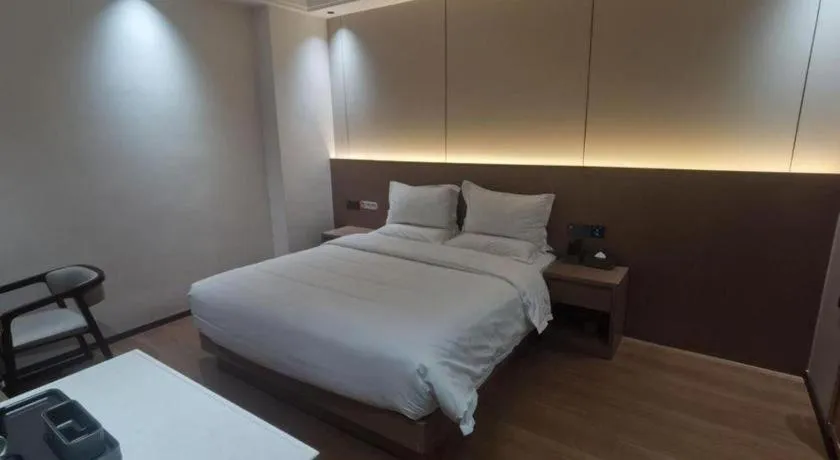 Bed in Borrman Hotel Chongqing Liberation Monument Hongyadong