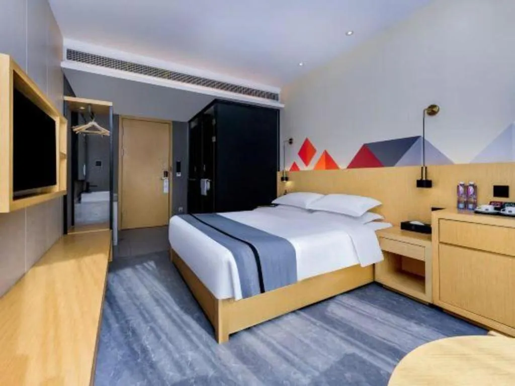 Bed in Borrman Hotel Chongqing Liberation Monument Hongyadong