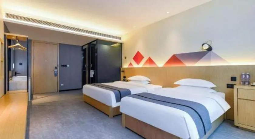 Bed in Borrman Hotel Chongqing Liberation Monument Hongyadong