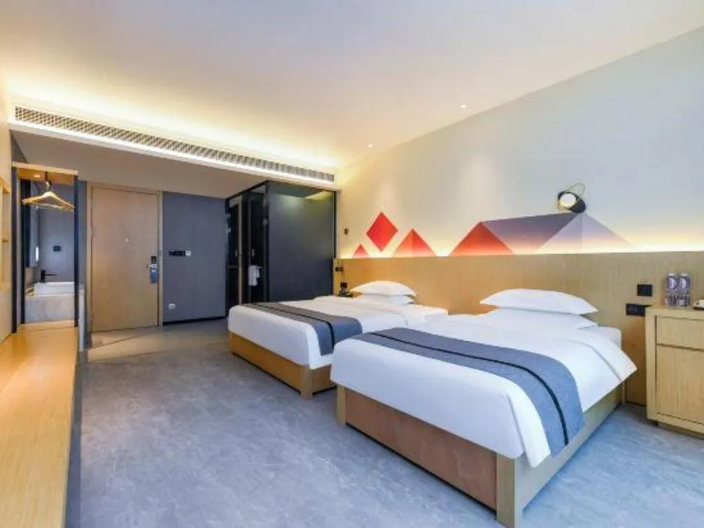 Bed in Borrman Hotel Chongqing Liberation Monument Hongyadong