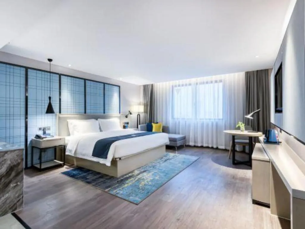 Bed in Echarm Hotel Huzhou Wuyue Plaza Children's Clothing City