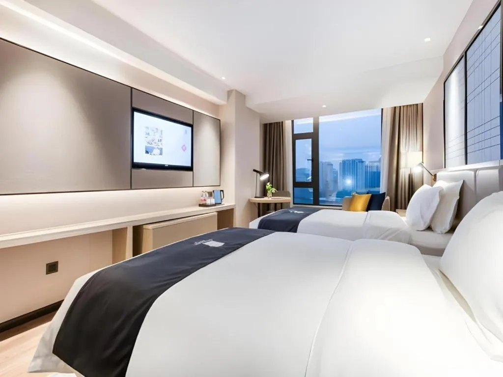 Bed in Echarm Hotel Huzhou Wuyue Plaza Children's Clothing City