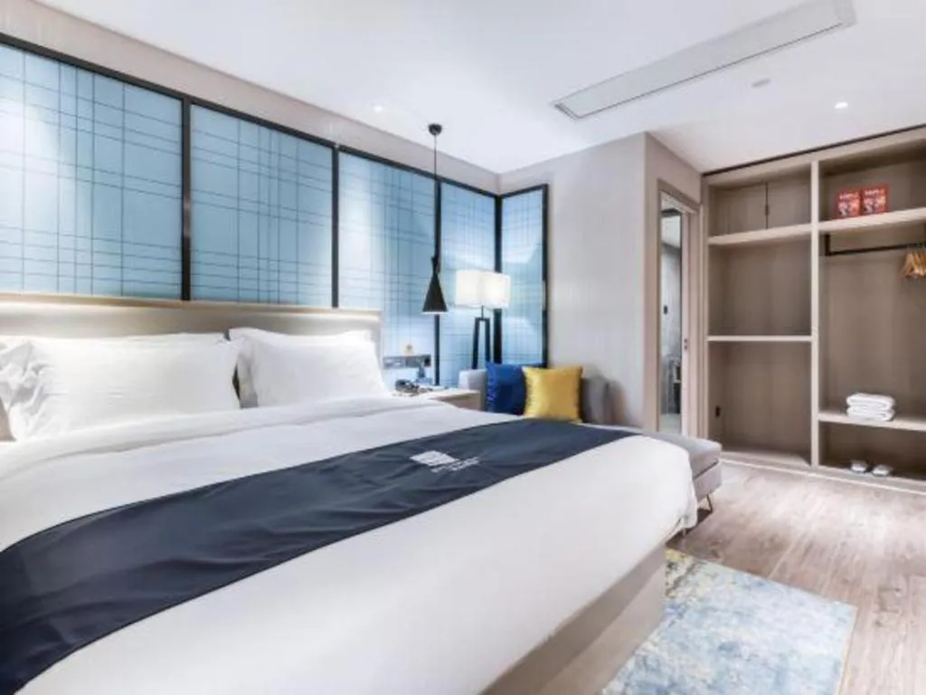 Bed in Echarm Hotel Huzhou Wuyue Plaza Children's Clothing City