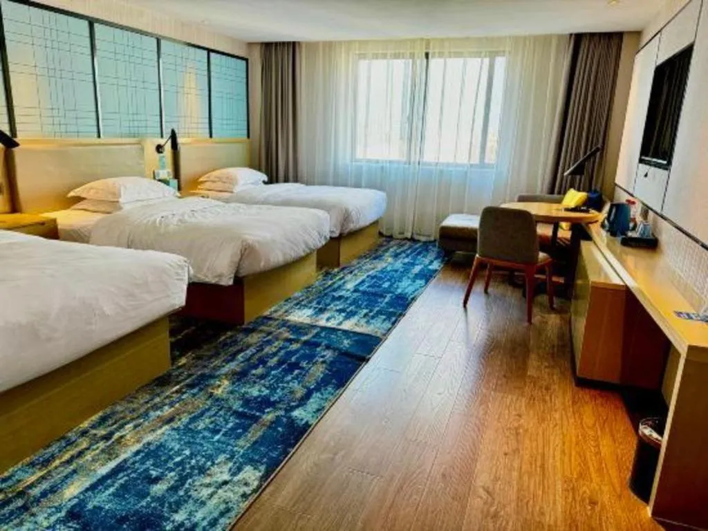 Bed in Echarm Hotel Huzhou Wuyue Plaza Children's Clothing City