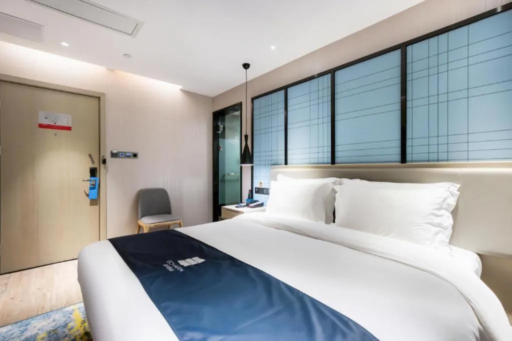 Bed in Echarm Hotel Huzhou Wuyue Plaza Children's Clothing City