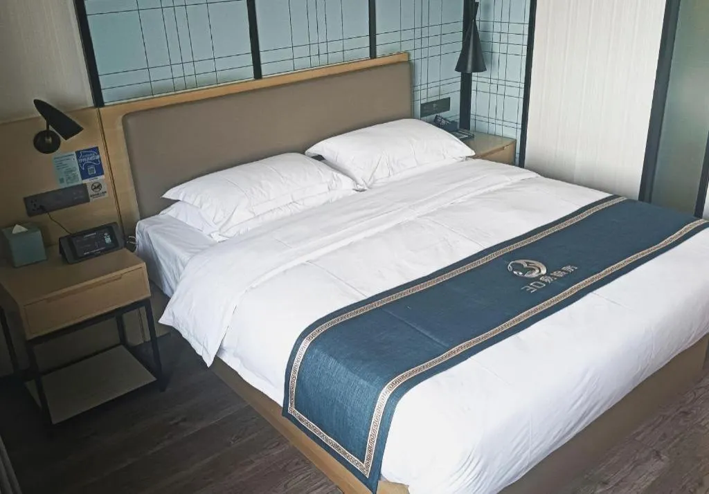 Bed in Echarm Hotel Huzhou Wuyue Plaza Children's Clothing City