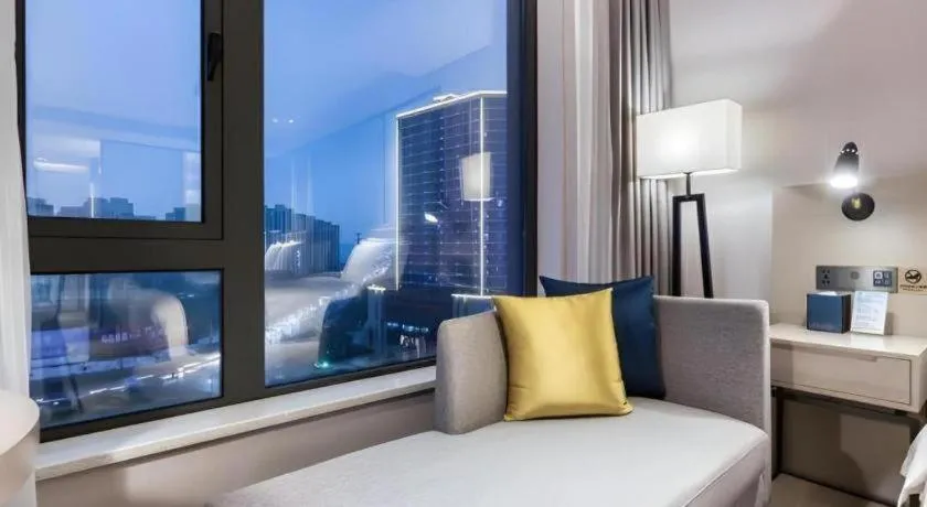 Bed in Echarm Hotel Huzhou Wuyue Plaza Children's Clothing City