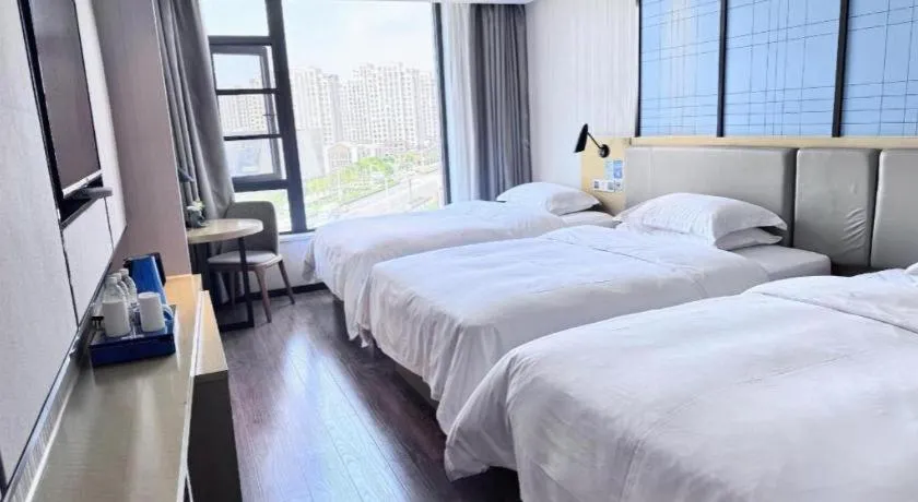 Bed in Echarm Hotel Huzhou Wuyue Plaza Children's Clothing City