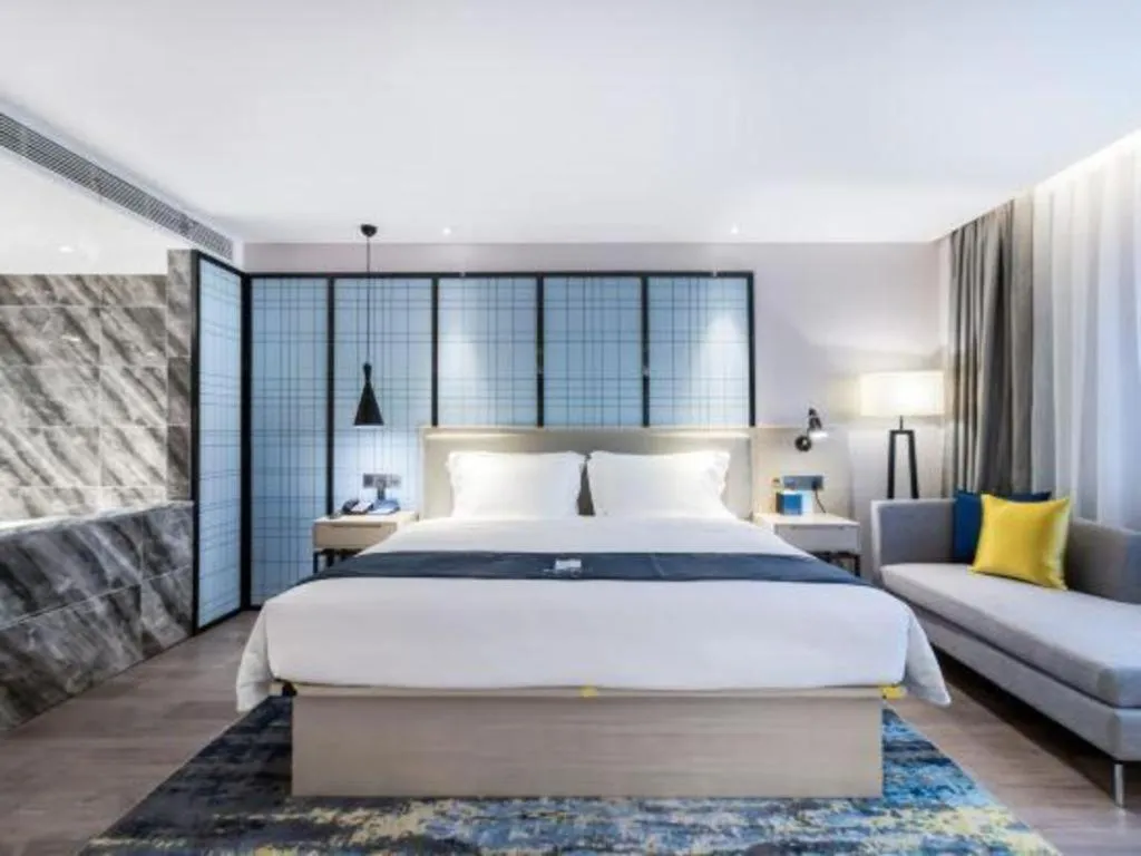 Bed in Echarm Hotel Huzhou Wuyue Plaza Children's Clothing City