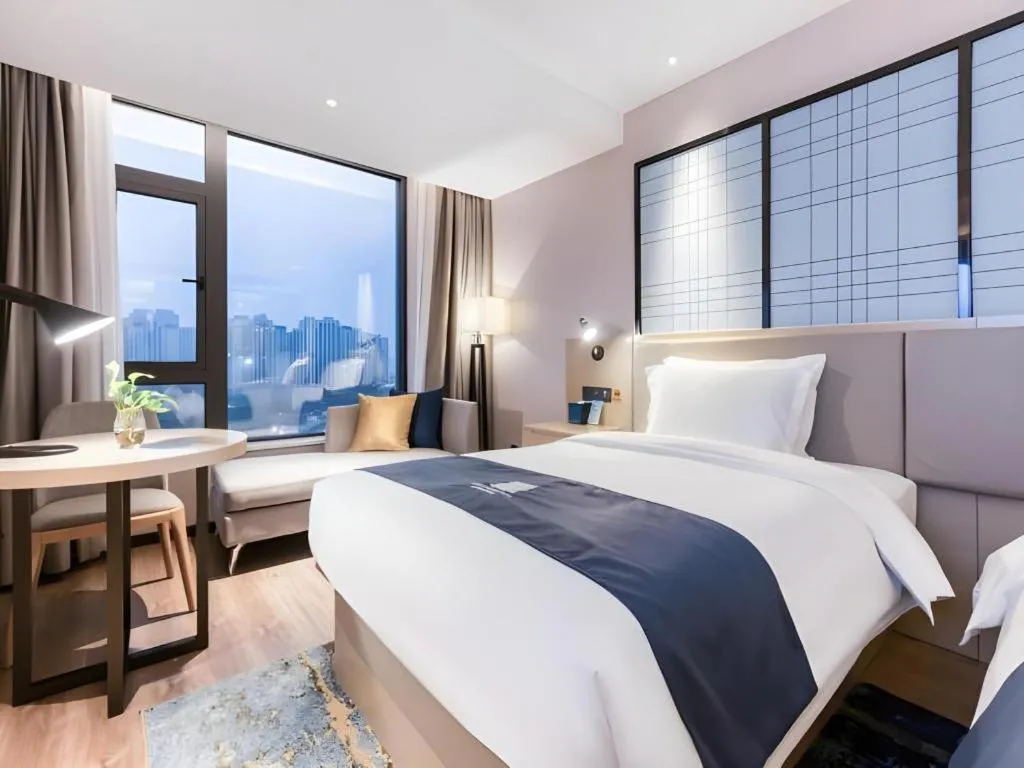 Bed in Echarm Hotel Huzhou Wuyue Plaza Children's Clothing City