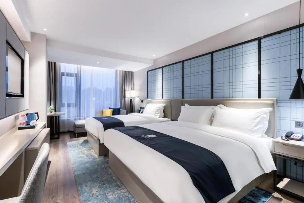 Bed in Echarm Hotel Huzhou Wuyue Plaza Children's Clothing City