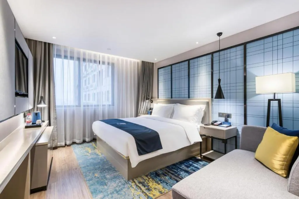 Bed in Echarm Hotel Huzhou Wuyue Plaza Children's Clothing City