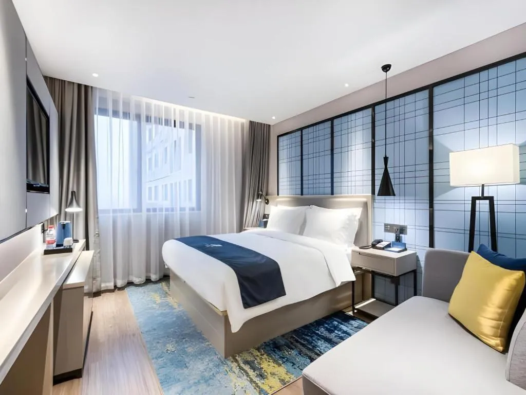 Bed in Echarm Hotel Huzhou Wuyue Plaza Children's Clothing City