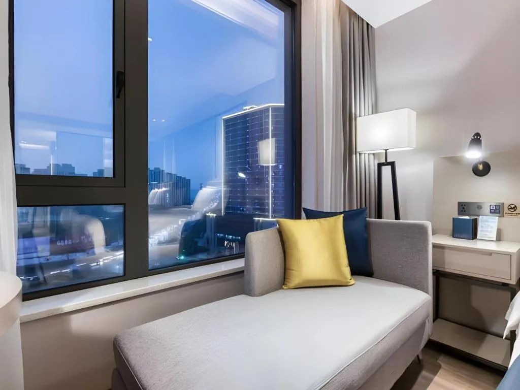 Bed in Echarm Hotel Huzhou Wuyue Plaza Children's Clothing City