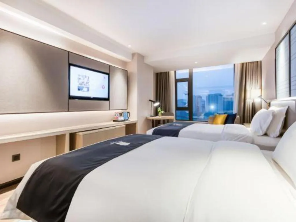 Bed in Echarm Hotel Huzhou Wuyue Plaza Children's Clothing City