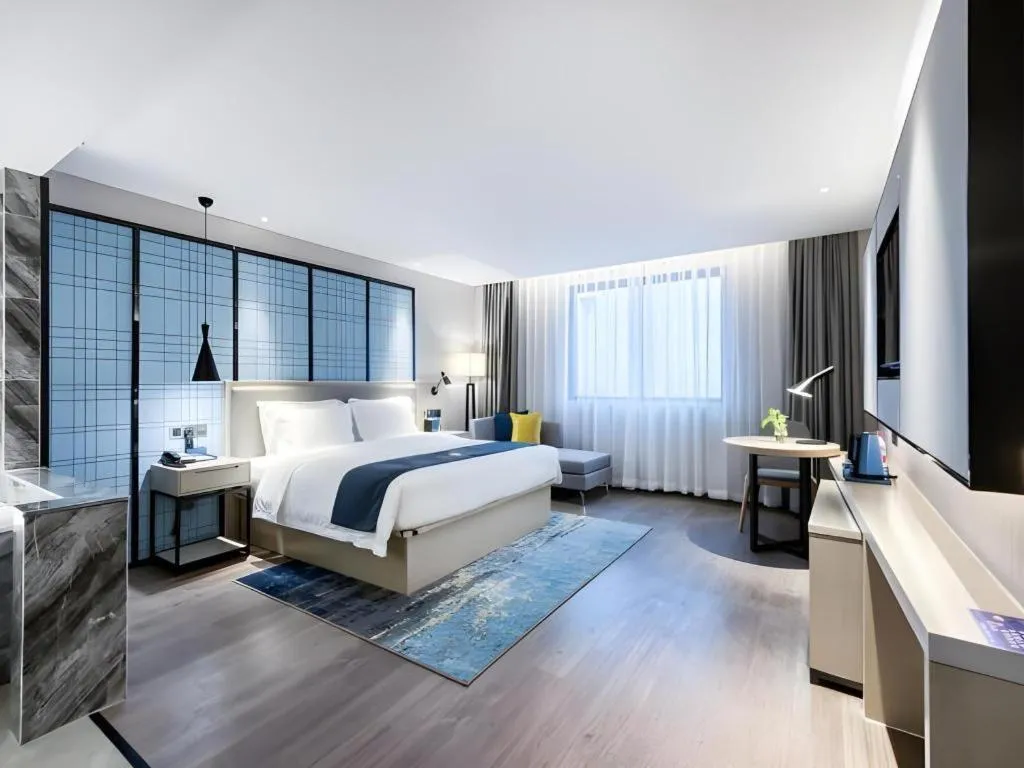 Bed in Echarm Hotel Huzhou Wuyue Plaza Children's Clothing City
