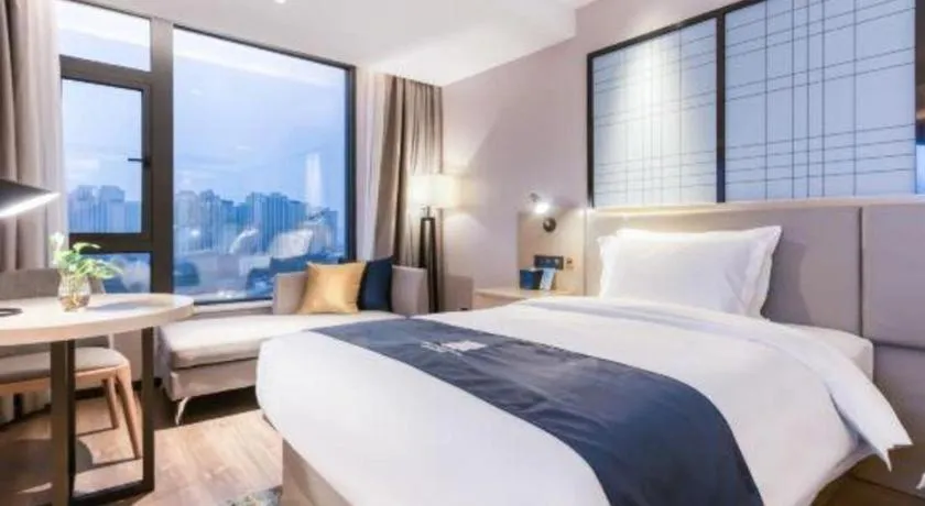 Bed in Echarm Hotel Huzhou Wuyue Plaza Children's Clothing City
