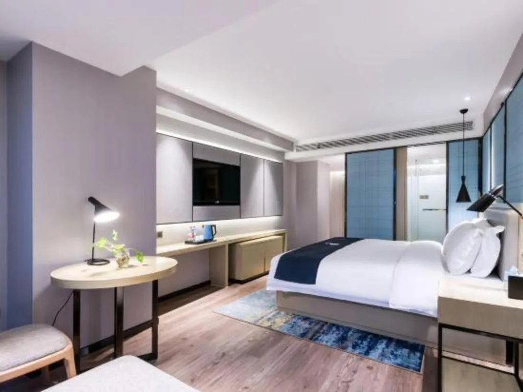Bed in Echarm Hotel Huzhou Wuyue Plaza Children's Clothing City