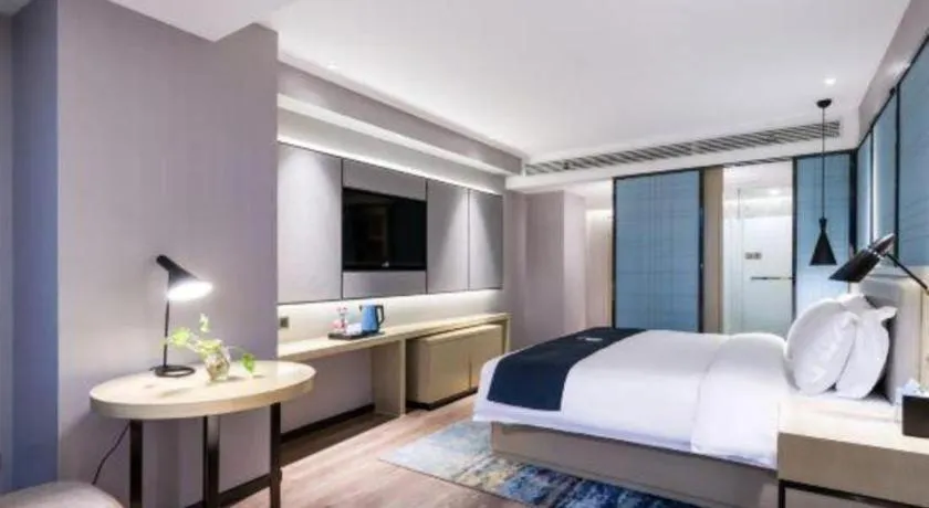 Bed in Echarm Hotel Huzhou Wuyue Plaza Children's Clothing City