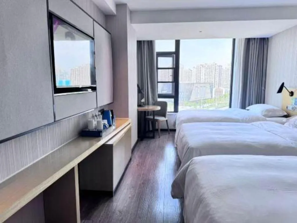 Bed in Echarm Hotel Huzhou Wuyue Plaza Children's Clothing City