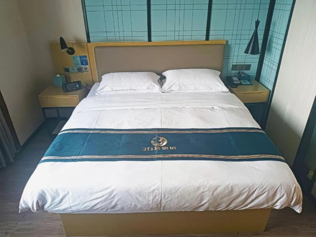 Bed in Echarm Hotel Huzhou Wuyue Plaza Children's Clothing City