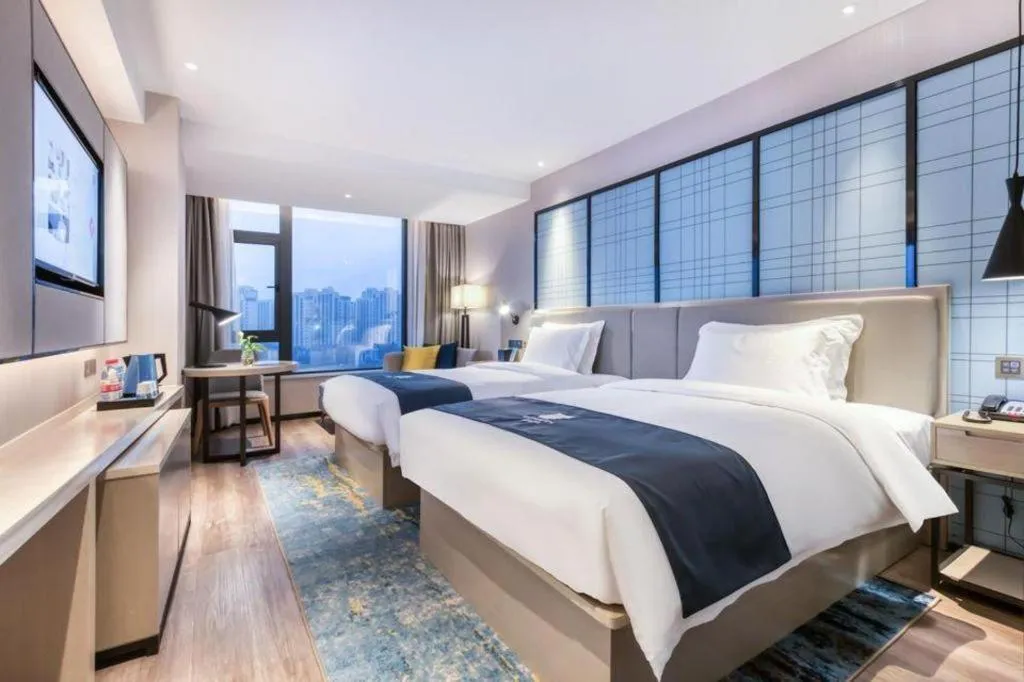 Bed in Echarm Hotel Huzhou Wuyue Plaza Children's Clothing City