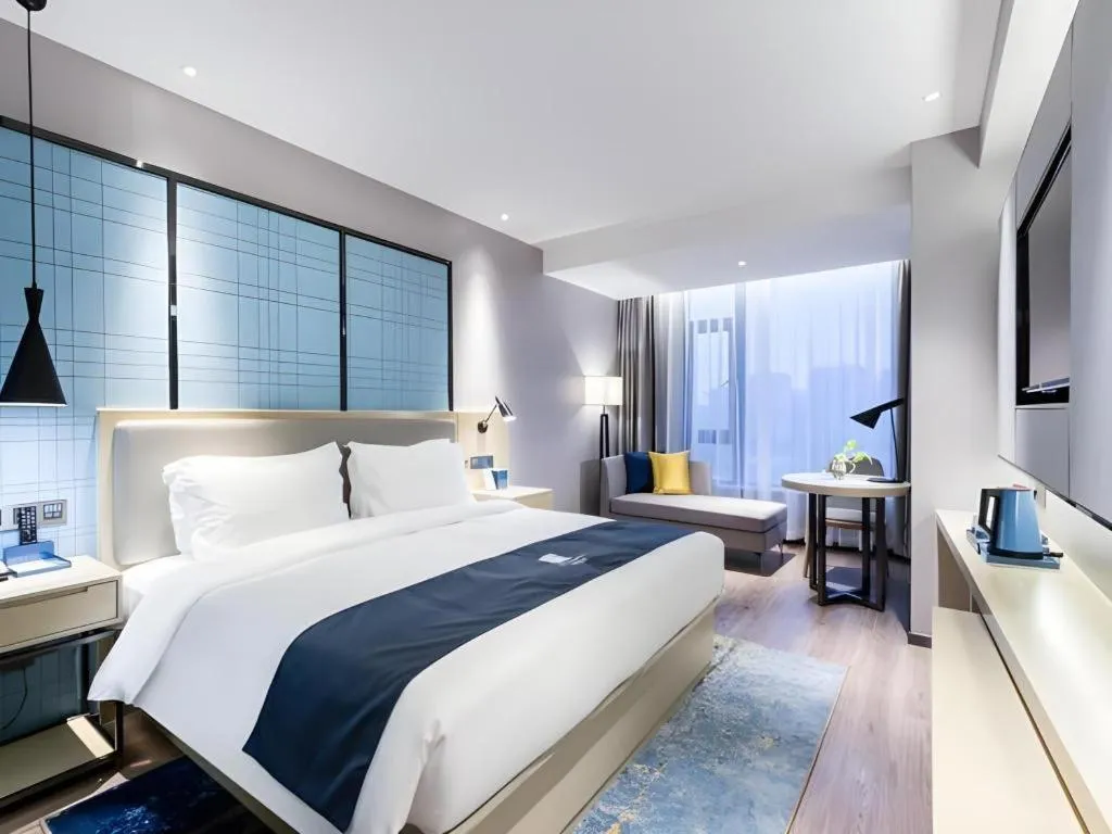 Bed in Echarm Hotel Huzhou Wuyue Plaza Children's Clothing City