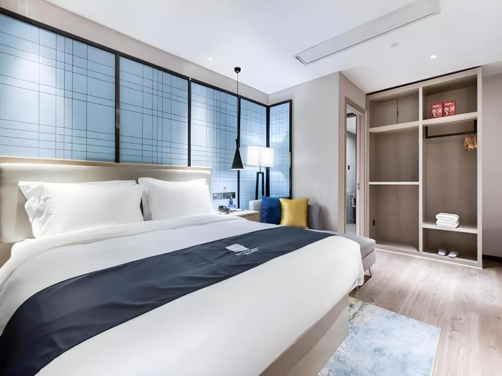 Bed in Echarm Hotel Huzhou Wuyue Plaza Children's Clothing City