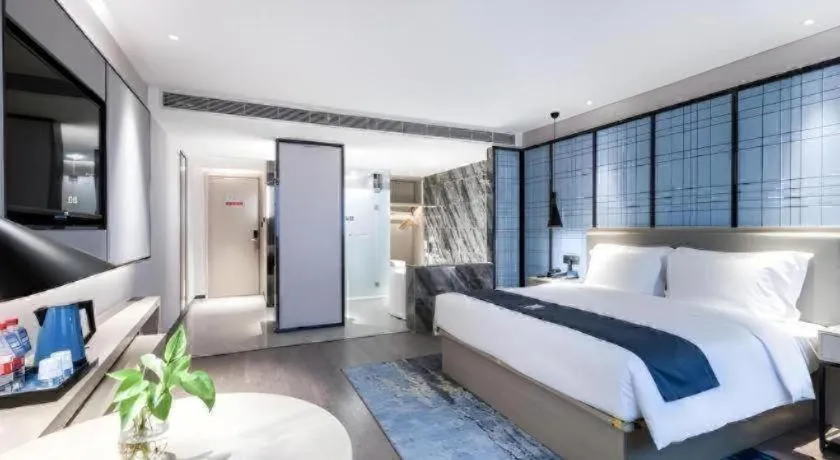 Bed in Echarm Hotel Huzhou Wuyue Plaza Children's Clothing City