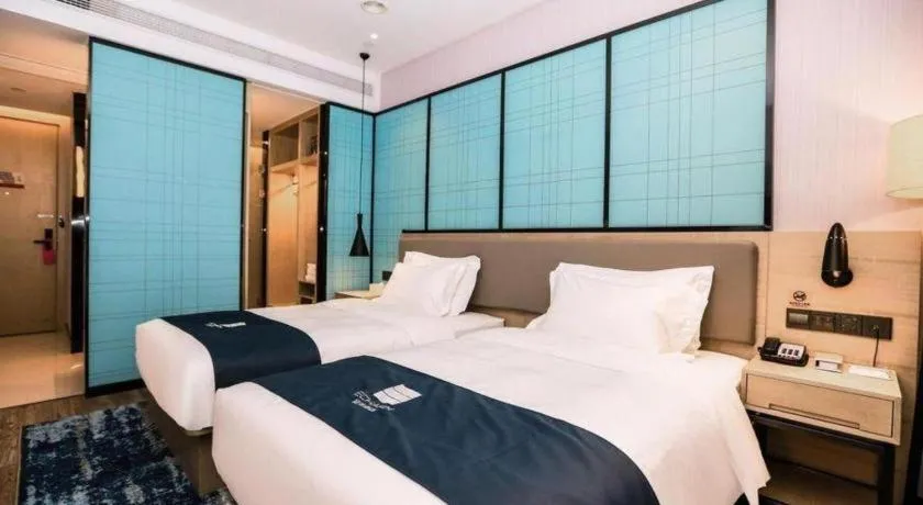 Bed in Echarm Hotel Hefei South Railway Station Qiupuhe Road Metro Station