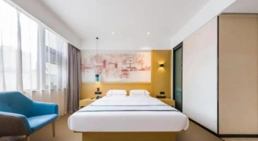 Bed in City Comfort Inn Kunming Flower City Midea Shuncheng Mansion