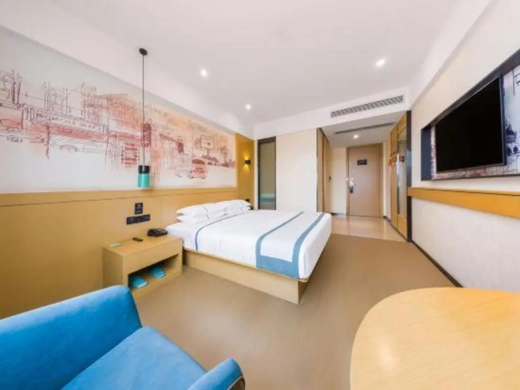 Bed in City Comfort Inn Kunming Flower City Midea Shuncheng Mansion