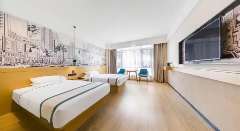 Bed in City Comfort Inn Kunming Flower City Midea Shuncheng Mansion