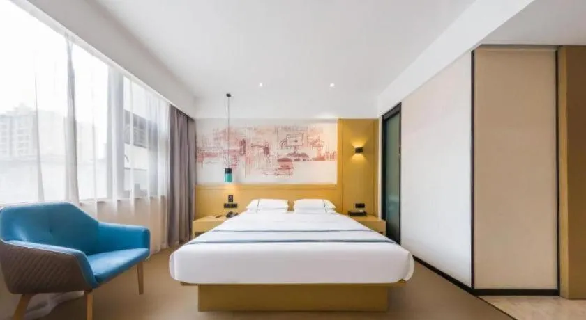 Bed in City Comfort Inn Kunming Flower City Midea Shuncheng Mansion