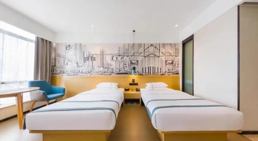 Bed in City Comfort Inn Kunming Flower City Midea Shuncheng Mansion