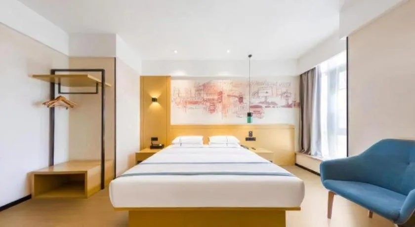 Bed in City Comfort Inn Kunming Flower City Midea Shuncheng Mansion