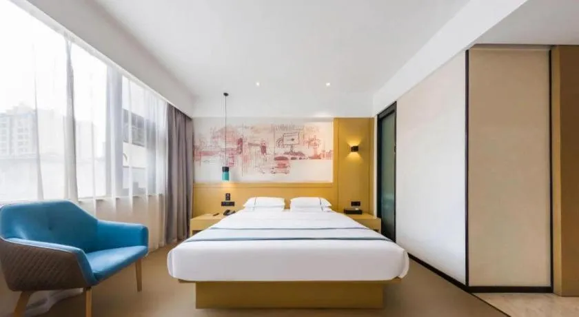 Bed in City Comfort Inn Kunming Flower City Midea Shuncheng Mansion