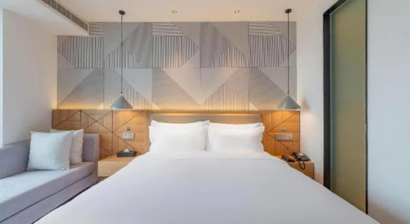 Bed in Borrman Hotel Jining Rencheng District Government Zhongde Plaza