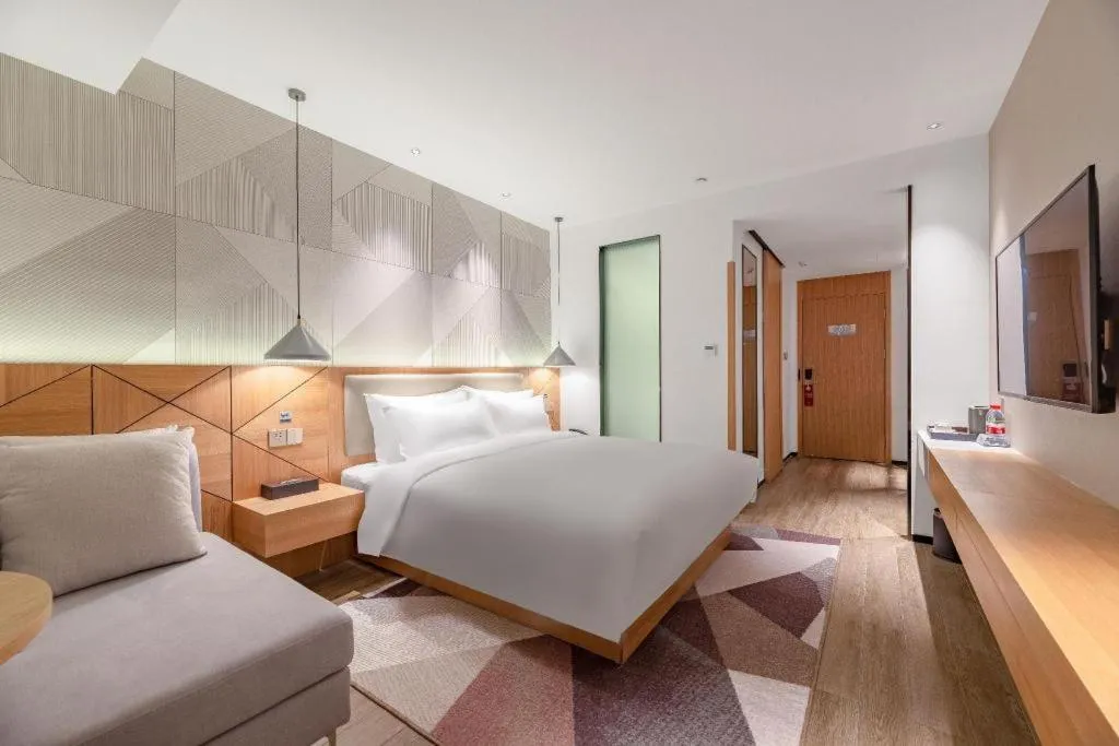 Bed in Borrman Hotel Jining Rencheng District Government Zhongde Plaza