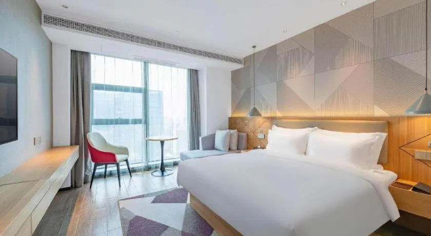 Bed in Borrman Hotel Jining Rencheng District Government Zhongde Plaza