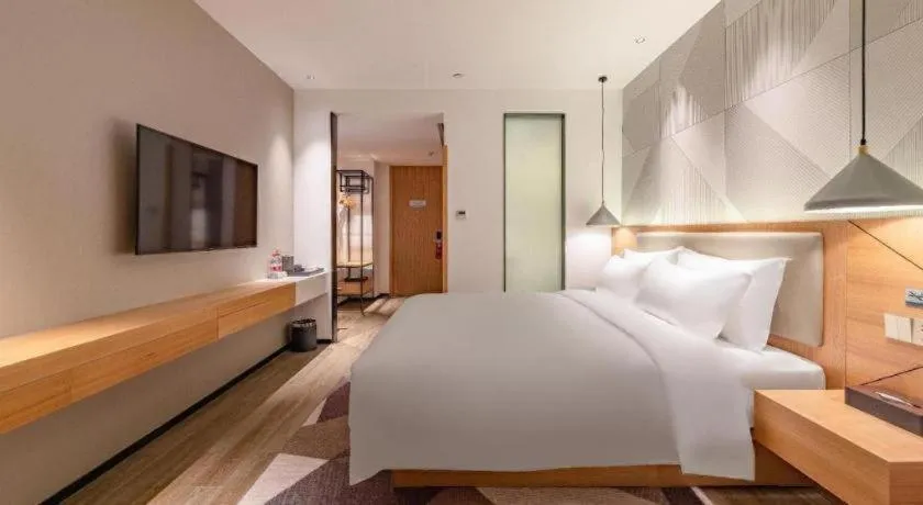 Bed in Borrman Hotel Jining Rencheng District Government Zhongde Plaza