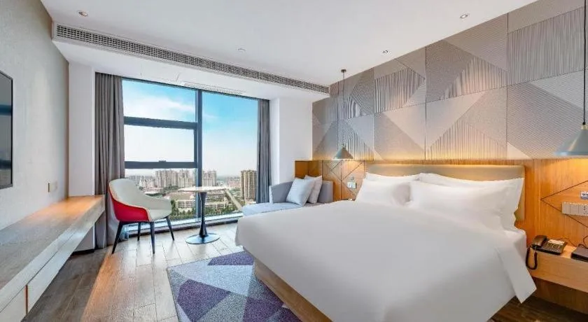 Bed in Borrman Hotel Jining Rencheng District Government Zhongde Plaza