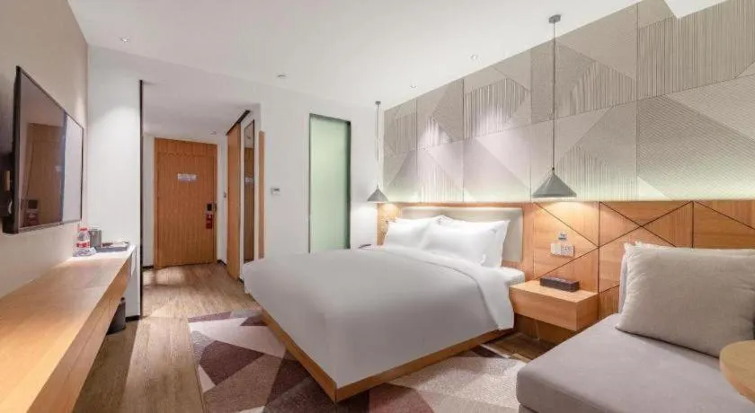 Bed in Borrman Hotel Jining Rencheng District Government Zhongde Plaza