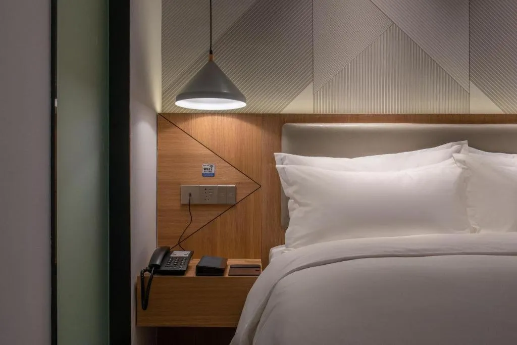 Bed in Borrman Hotel Jining Rencheng District Government Zhongde Plaza